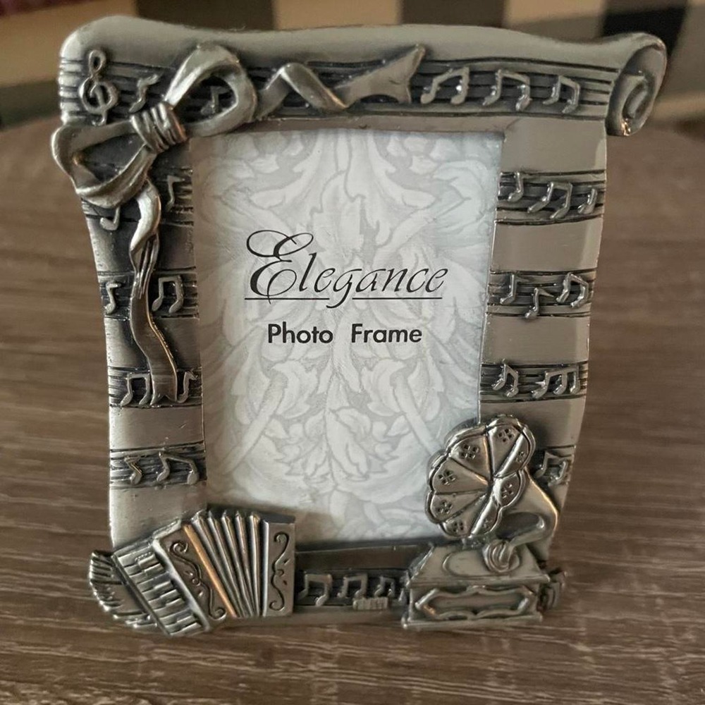 Vintage Silver music-themed photo frame with musical notes and instruments
